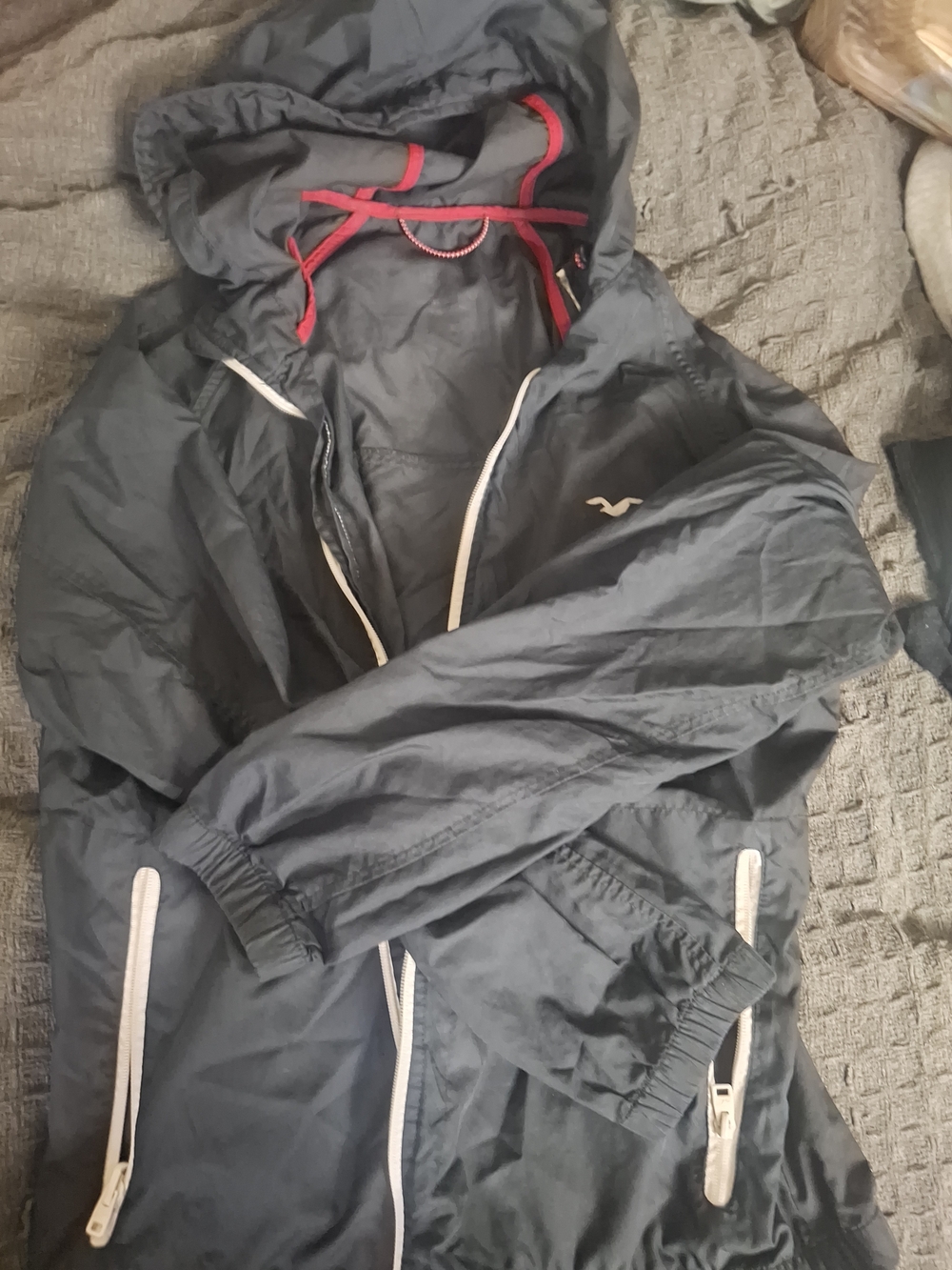 Hollister Navy Hooded Windbreaker with White Trim and Red Accents